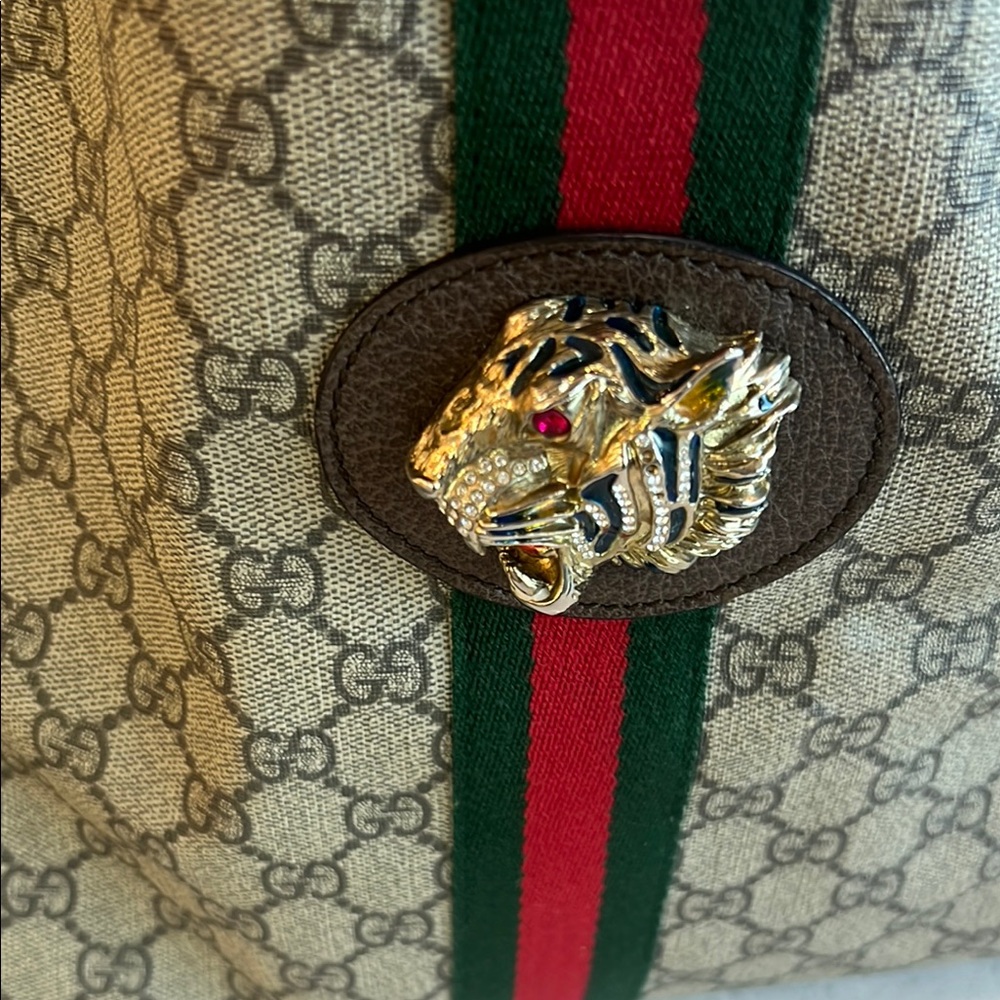 Gucci Brown Backpack with Iconic Monogram and Leather Trim